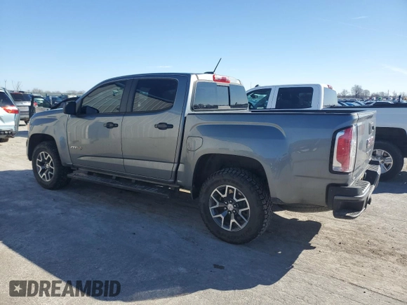 2021 GMC Canyon 4WD AT4 w/Leather with VIN 1GTG6FEN3M1180062, listed as a Copart auction lot 48116395 with 73,933 mi miles and Salvage Title. Bid and sale history available at carsss.com. Image 2.