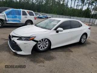 2018 Toyota Camry LE с VIN 4T1B11HK8JU101178, выставлен на аукционе Copart как лот 57557225 с пробегом 92 445 миль миль и Списание • Salvage title. История ставок и продаж доступна на DreamBid. Изображение 1.
