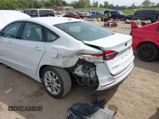 2019 Ford Fusion Hybrid SE with VIN 3FA6P0LU6KR267365, listed as a IAAI auction lot 42030525 with 95,401 mi miles. Bid and sale history available at carsss.com. Image 6.