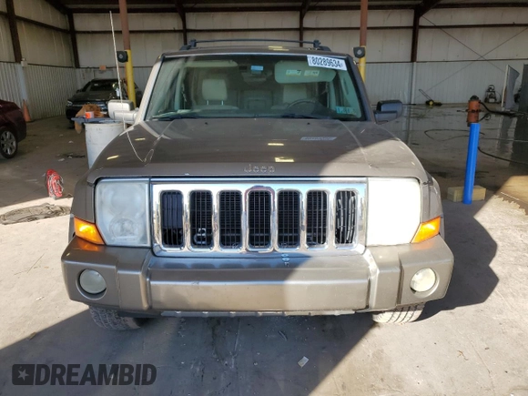 2006 Jeep Commander Limited z VIN 1J8HG58N86C305693, wystawiony jako Copart lot #80289634 z przebiegiem 158 711 mil mil oraz Szkoda całkowita • Salvage title. Historia ofert i sprzedaży dostępna na DreamBid. Obrazek 5.