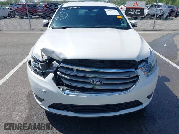 2016 Ford Taurus SEL with VIN 1FAHP2E88GG131659, listed as a IAAI auction lot 42205065 with 99,416 mi miles and . Bid and sale history available at DreamBid. Image 6.