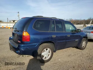 2003 GMC Envoy SLE with VIN 1GKDT13SX32318460, listed as a Copart auction lot 51370825 with 151,561 mi miles and Clean Title. Bid and sale history available at carsss.com. Image 3.