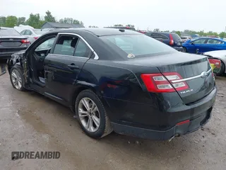 2015 Ford Taurus SEL z VIN 1FAHP2E86FG172631, wystawiony jako IAAI lot #42307630 z przebiegiem 95 184 mil mil oraz . Historia ofert i sprzedaży dostępna na DreamBid. Obrazek 3.
