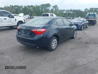 2018 Toyota Corolla L with VIN 2T1BURHE6JC995411, listed as a IAAI auction lot 42516337 with 98,066 mi miles and . Bid and sale history available at DreamBid. Image 4.