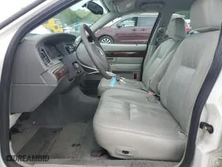2004 Mercury Grand Marquis LS Premium with VIN 2MEFM75W34X667347, listed as a Copart auction lot 61209224 with 129,345 mi miles and Salvage Title. Bid and sale history available at carsss.com. Image 7.