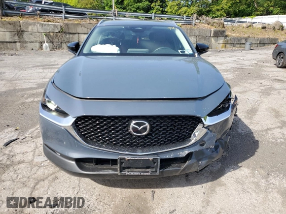 2024 Mazda CX-30 S Carbon Edition with VIN 3MVDMBCM0RM641898, listed as a Copart auction lot 57712225 with 9,185 mi miles and Salvage title. Bid and sale history available at DreamBid. Image 5.