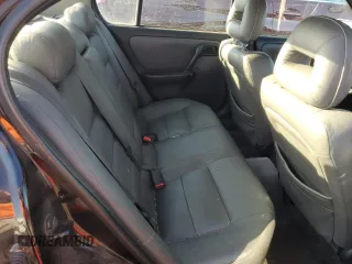1999 Infiniti G20 z VIN JNKCP11A6XT003028, wystawiony jako Copart lot #72412504 z przebiegiem 157 279 mil mil oraz Szkody całkowita. Historia ofert i sprzedaży dostępna na DreamBid. Obrazek 10.