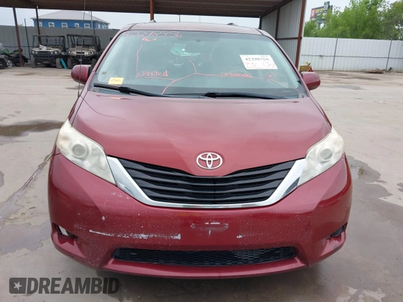 2014 Toyota Sienna LE AAS z VIN 5TDKK3DC9ES466877, wystawiony jako IAAI lot #42298356 z przebiegiem 189 826 mil mil oraz . Historia ofert i sprzedaży dostępna na DreamBid. Obrazek 12.