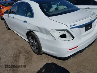 2017 Mercedes-Benz E 300 Luxury with VIN WDDZF4KBXHA102915, listed as a IAAI auction lot 42082617 with 66,641 mi miles and . Bid and sale history available at carsss.com. Image 6.