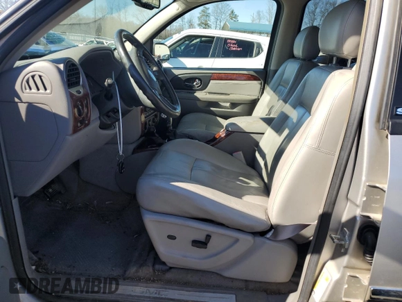 2006 GMC Envoy SLT with VIN 1GKDS13S362362176, listed as a Copart auction lot 43038795 with 180,279 mi miles and Salvage Title. Bid and sale history available at carsss.com. Image 7.