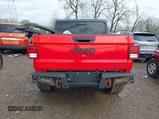 2021 Jeep Gladiator Freedom z VIN 1C6HJTAG0ML547293, wystawiony jako IAAI lot #41926067 z przebiegiem 57 696 mil mil oraz . Historia ofert i sprzedaży dostępna na DreamBid. Obrazek 15.