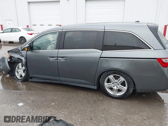 2011 Honda Odyssey Touring Elite with VIN 5FNRL5H9XBB090616, listed as a IAAI auction lot 41944510 with 207,962 mi miles and . Bid and sale history available at DreamBid. Image 15.