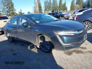 2018 Honda Clarity Plug-In Hybrid with VIN JHMZC5F1XJC009251, listed as a IAAI auction lot 41674492 with 85,466 mi miles. Bid and sale history available at carsss.com. Image 1.