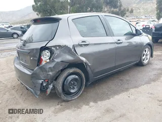 2013 Toyota Yaris L with VIN JTDKTUD34DD547878, listed as a IAAI auction lot 42108444 with 241,269 mi miles. Bid and sale history available at carsss.com. Image 4.