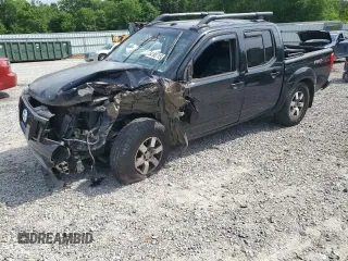 2012 Nissan Frontier Pro-4X z VIN 1N6AD0EV4CC405470, wystawiony jako Copart lot #54186715 z przebiegiem Nie podano mil oraz Szkoda całkowita • Salvage title. Historia ofert i sprzedaży dostępna na DreamBid. Obrazek 1.