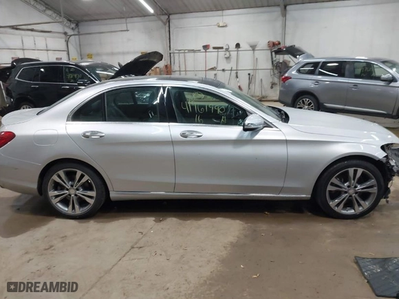 2016 Mercedes-Benz C-Class C 300 Luxury with VIN 55SWF4KB4GU163095, listed as a IAAI auction lot 41961990 with 41,293 mi miles. Bid and sale history available at carsss.com. Image 14.