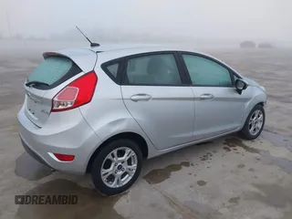 2016 Ford Fiesta SE with VIN 3FADP4EJ6GM111767, listed as a IAAI auction lot 41843978 with 109,294 mi miles. Bid and sale history available at carsss.com. Image 4.