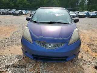2009 Honda Fit with VIN JHMGE882X9S007865, listed as a Copart auction lot 61025875 with 159,919 mi miles and Clean title. Bid and sale history available at DreamBid. Image 5.