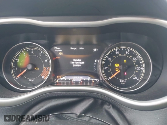 2015 Jeep Cherokee Trailhawk with VIN 1C4PJMBSXFW667469, listed as a IAAI auction lot 42438006 with 127,136 mi miles and . Bid and sale history available at DreamBid. Image 7.