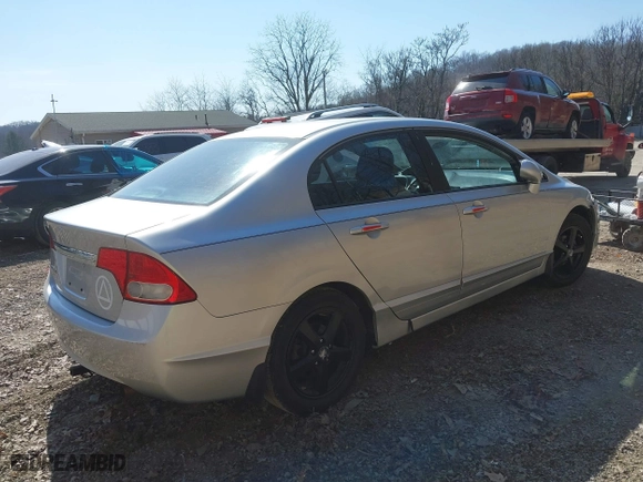 2010 Honda Civic Sdn EX with VIN 19XFA1F84AE035594, listed as a IAAI auction lot 41752445 with 173,264 mi miles. Bid and sale history available at carsss.com. Image 4.