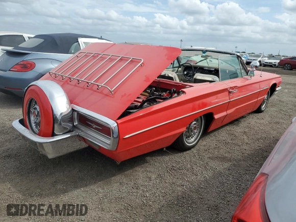 1964 Ford Thunderbird with VIN 4AY85Z103227, listed as a Copart auction lot 74697154 with 87,726 mi miles and Salvage Title. Bid and sale history available at DreamBid. Image 3.