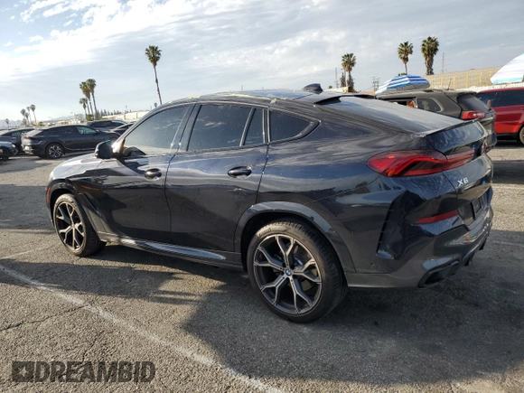 2021 BMW X6 xDrive40i with VIN 5UXCY6C04M9H02068, listed as a Copart auction lot 46938645 with 21,913 mi miles and Salvage Title. Bid and sale history available at carsss.com. Image 2.