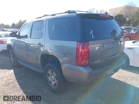2012 GMC Yukon SLE with VIN 1GKS1AE06CR218372, listed as a IAAI auction lot 41591288 with 166,596 mi miles. Bid and sale history available at carsss.com. Image 14.
