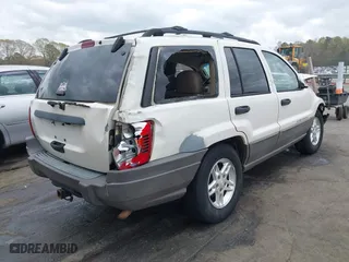 2003 Jeep Grand Cherokee Laredo with VIN 1J4GW48S33C521253, listed as a IAAI auction lot 41929756 with 209,686 mi miles. Bid and sale history available at carsss.com. Image 4.