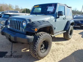 2015 Jeep Wrangler Sport with VIN 1C4AJWAG0FL591213, listed as a IAAI auction lot 41893306 with 107,807 mi miles and . Bid and sale history available at DreamBid. Image 17.