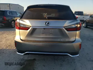 2021 Lexus RX 350L z VIN JTJHZKEA0M2019757, wystawiony jako Copart lot #71006144 z przebiegiem Nie podano mil oraz Szkoda całkowita • Salvage title. Historia ofert i sprzedaży dostępna na DreamBid. Obrazek 6.