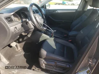 2015 Volkswagen Jetta SE z VIN 3VWD17AJ5FM309965, wystawiony jako Copart lot #54930665 z przebiegiem 141 918 mil mil oraz Szkoda całkowita • Salvage title. Historia ofert i sprzedaży dostępna na DreamBid. Obrazek 7.