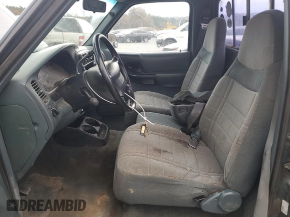 1997 Ford Ranger XLT with VIN 1FTCR11X2VTA87152, listed as a Copart auction lot 81559504 with 261,925 mi miles and Salvage title. Bid and sale history available at DreamBid. Image 7.