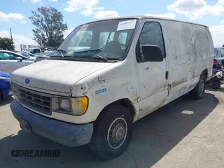 1993 Ford Econoline Cargo with VIN 1FTEE14H6PHB61400, listed as a IAAI auction lot 41889312 with 270,464 mi miles and . Bid and sale history available at DreamBid. Image 2.