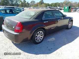 2005 Chrysler 300 with VIN 2C3AA63H75H577363, listed as a IAAI auction lot 41892999 with 229,634 mi miles. Bid and sale history available at carsss.com. Image 4.
