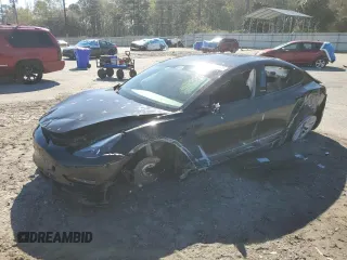 2021 Tesla Model 3 Standard Range Plus z VIN 5YJ3E1EA4MF920047, wystawiony jako Copart lot #50460325 z przebiegiem Nie podano mil oraz Szkody całkowita. Historia ofert i sprzedaży dostępna na DreamBid. Obrazek 1.