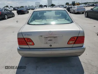 1999 Mercedes-Benz E-Class with VIN WDBJF65H2XA796192, listed as a Copart auction lot 64326604 with 237,141 mi miles and Clean Title. Bid and sale history available at carsss.com. Image 6.