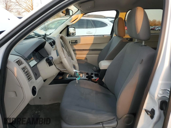 2010 Ford Escape XLS with VIN 1FMCU9C71AKC41887, listed as a Copart auction lot 87117884 with 126,687 mi miles and Clean title. Bid and sale history available at DreamBid. Image 7.