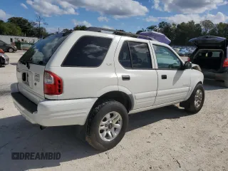 2002 Isuzu Rodeo S with VIN 4S2CK58W124322241, listed as a Copart auction lot 79009994 with 131,793 mi miles and Salvage Title. Bid and sale history available at DreamBid. Image 3.
