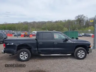2004 Dodge Dakota SLT z VIN 1D7HG48N54S664848, wystawiony jako IAAI lot #42152635 z przebiegiem 153 824 mil mil oraz . Historia ofert i sprzedaży dostępna na DreamBid. Obrazek 13.
