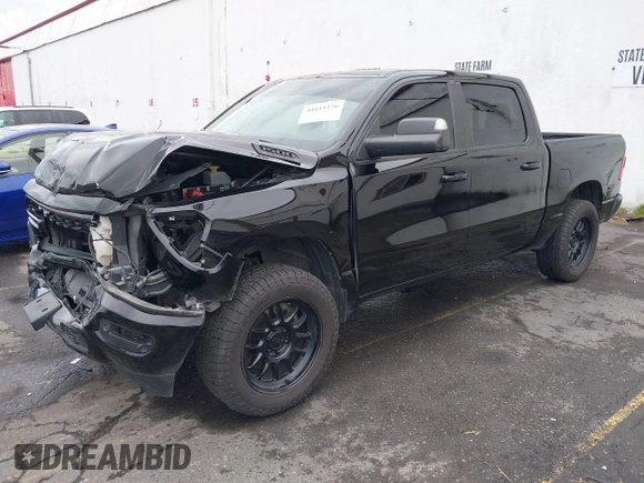 2019 Ram 1500 Big Horn/Lone Star with VIN 1C6SRFFT9KN625013, listed as a IAAI auction lot 41611276 with 100,463 mi miles. Bid and sale history available at carsss.com. Image 2.