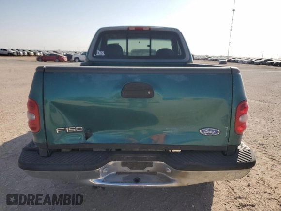 1997 Ford F-150 XL with VIN 1FTDF08W6VKC33983, listed as a Copart auction lot 51297975 with 187,657 mi miles and Salvage Title. Bid and sale history available at carsss.com. Image 6.