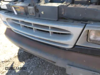1999 Ford Econoline Cargo with VIN 1FTRE1422XHA33460, listed as a IAAI auction lot 41326443 with 119,294 mi miles. Bid and sale history available at carsss.com. Image 6.