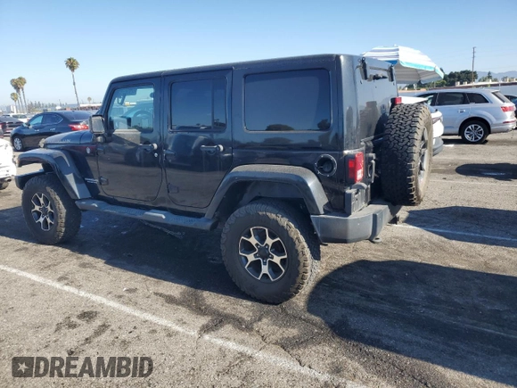 2012 Jeep Wrangler Unlimited Rubicon with VIN 1C4HJWFG9CL276753, listed as a Copart auction lot 62996995 with 234,159 mi miles and Clean title. Bid and sale history available at DreamBid. Image 2.
