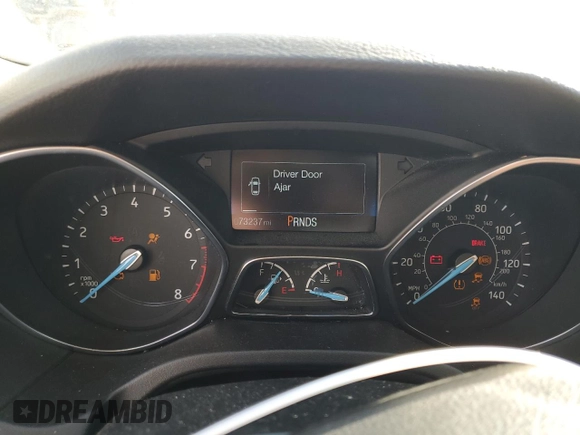 2018 Ford Focus SE z VIN 1FADP3FE8JL331853, wystawiony jako Copart lot #74013984 z przebiegiem 73 237 mil mil oraz Szkoda całkowita • Salvage title. Historia ofert i sprzedaży dostępna na DreamBid. Obrazek 9.