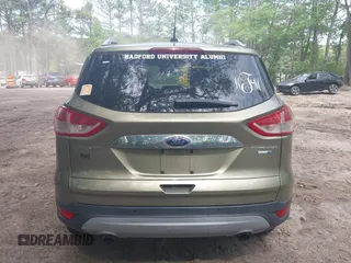 2014 Ford Escape Titanium with VIN 1FMCU9JX9EUB23972, listed as a IAAI auction lot 42217298 with 164,556 mi miles and . Bid and sale history available at DreamBid. Image 16.