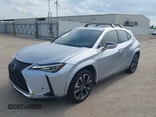 2023 Lexus UX 250h Premium z VIN JTHP6JBH5P2145912, wystawiony jako IAAI lot #42401353 z przebiegiem 14 252 mil mil oraz . Historia ofert i sprzedaży dostępna na DreamBid. Obrazek 17.
