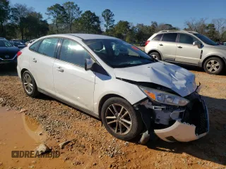 2018 Ford Focus SE with VIN 1FADP3F23JL220312, listed as a Copart auction lot 46903995 with 128,549 mi miles and Salvage Title. Bid and sale history available at carsss.com. Image 4.