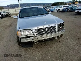 2000 Mercedes-Benz C 230 Kompressor with VIN WDBHA24GXYA802790, listed as a Copart auction lot 87460324 with 156,593 mi miles and Salvage Title. Bid and sale history available at carsss.com. Image 10.