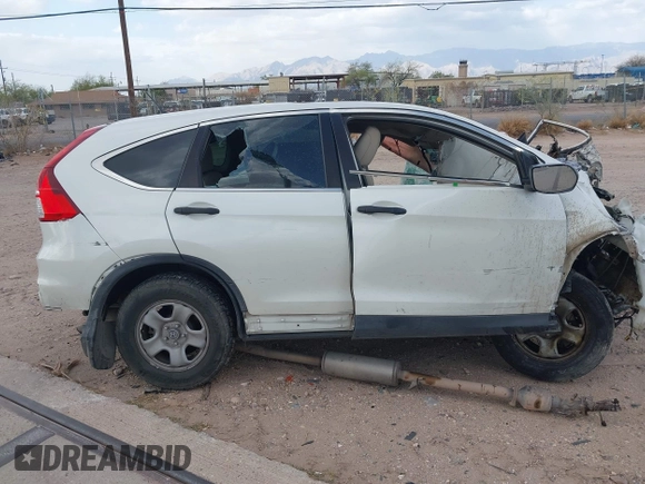 2015 Honda CR-V LX with VIN 5J6RM3H3XFL023217, listed as a IAAI auction lot 41950339 with Not Provided miles and . Bid and sale history available at carsss.com. Image 13.
