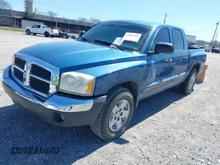 2005 Dodge Dakota SLT with VIN 1D7HW48N05S339156, listed as a IAAI auction lot 41862684 with 158,796 mi miles and . Bid and sale history available at DreamBid. Image 2.